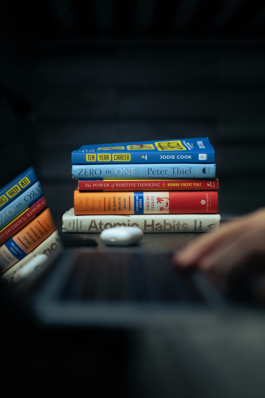 programming books and laptop