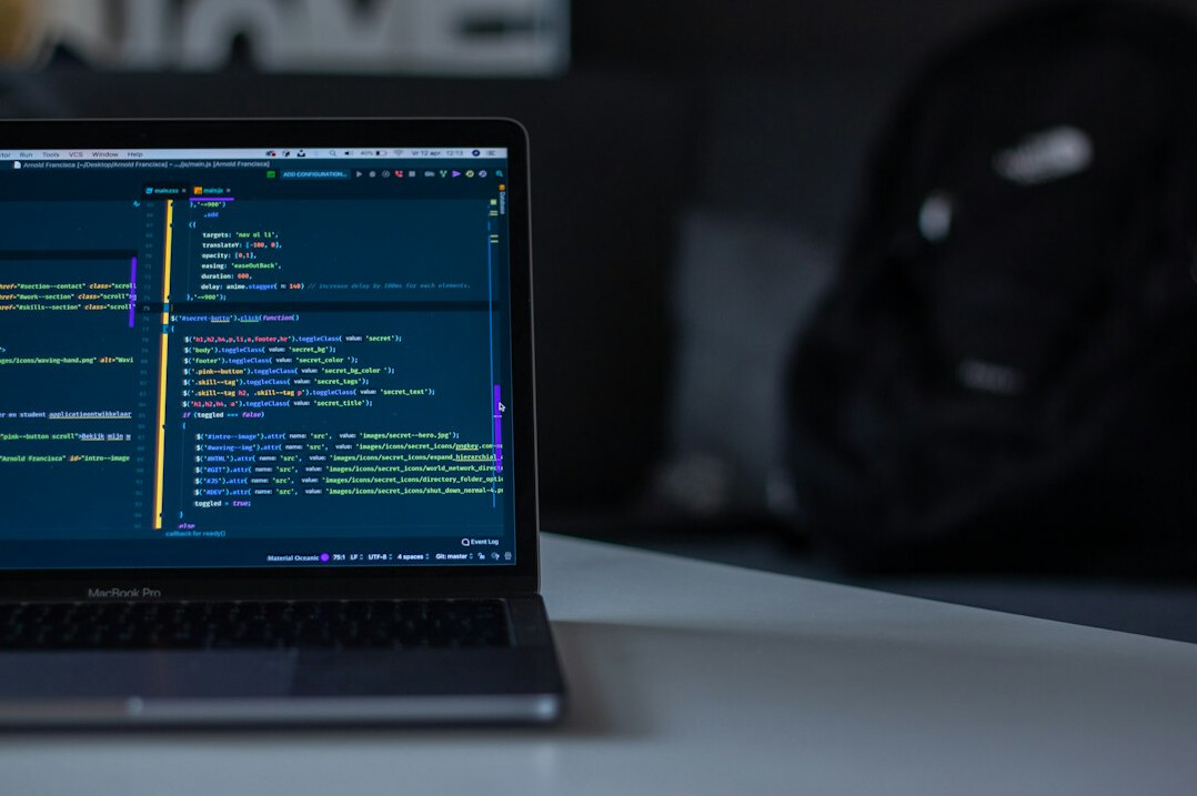 beginner learning to code on laptop