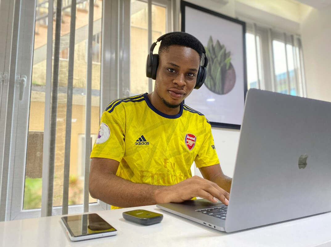 happy student with laptop